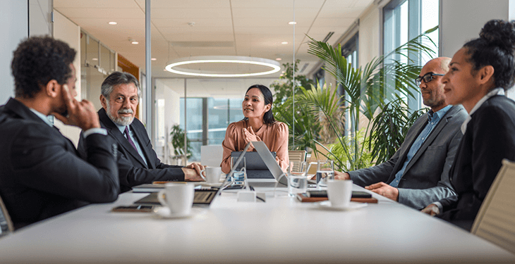 A group of professionals having a meeting at an office